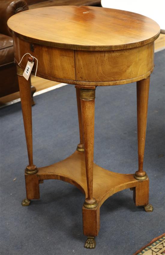 A 19th century French gilt metal mounted cherry wood oval work table W.60cm